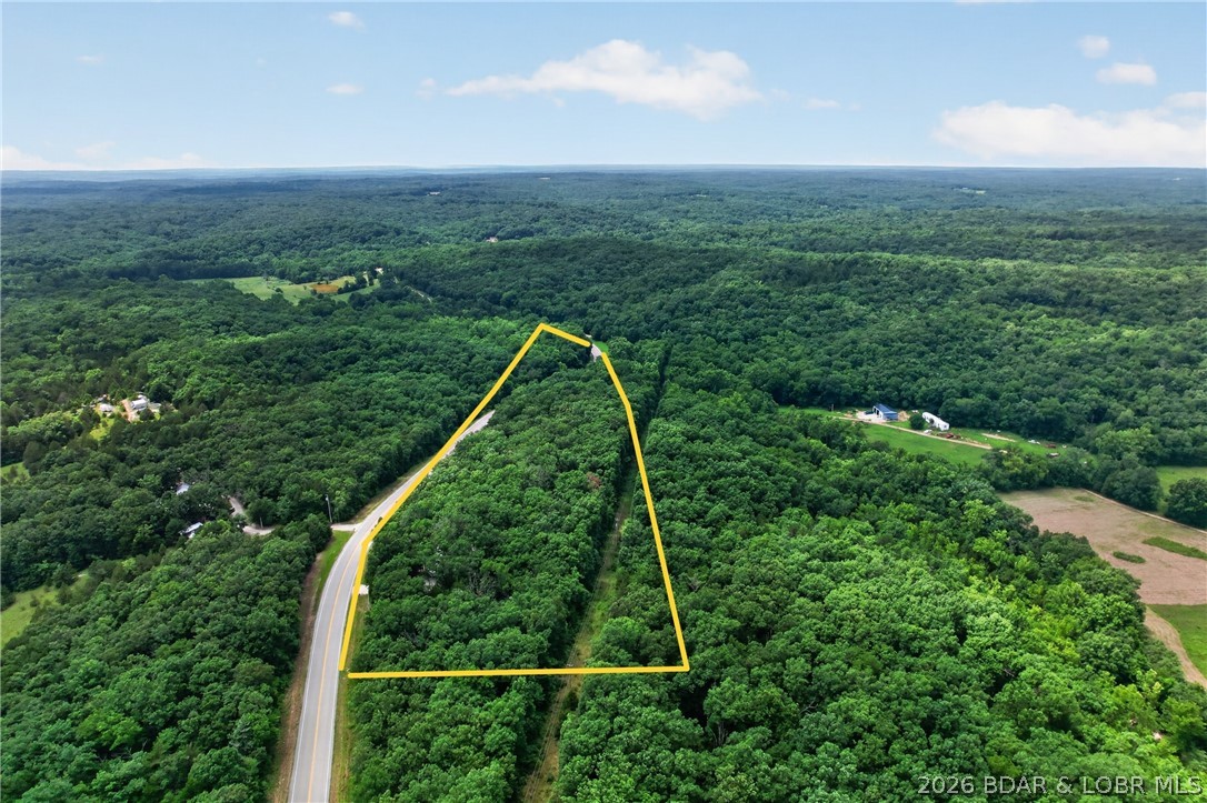 25145 State Route West Barnett, MO 65011 - Photo 51 of 58 This is a must see, partially cleared from underbr