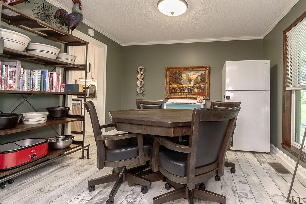 5870 Monk House Road Somerville, TN 38068 - Photo 18 of 40 a view of a workspace with furniture and a window