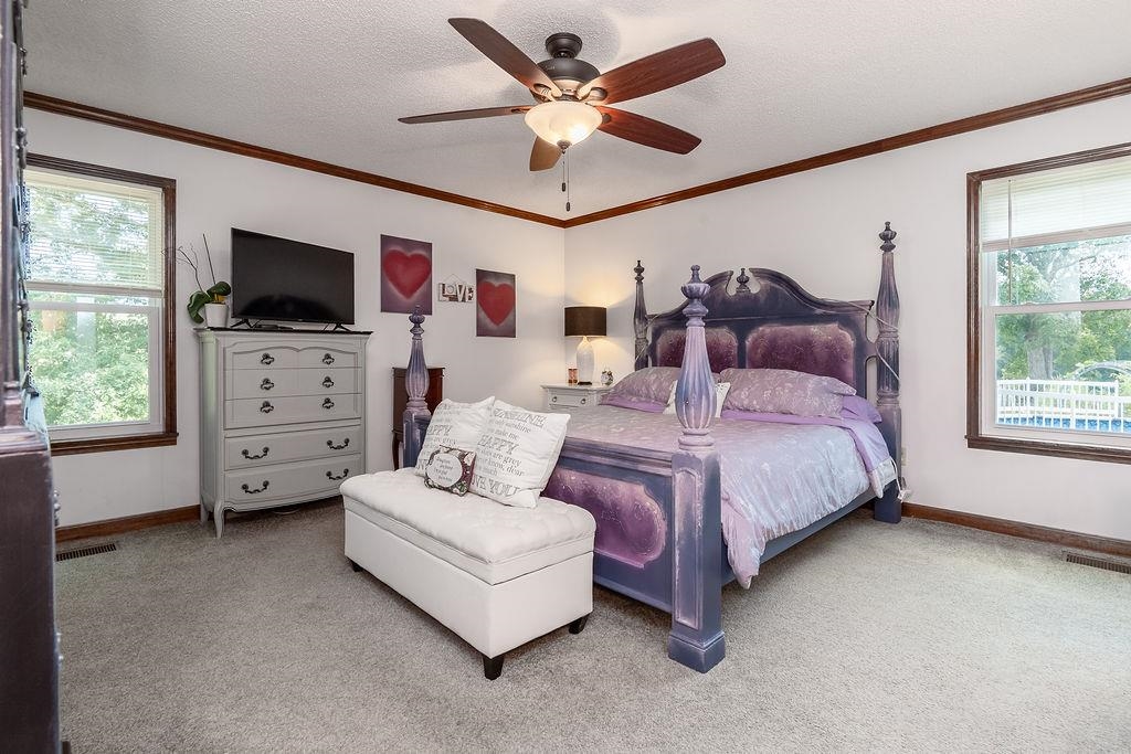 5870 Monk House Road Somerville, TN 38068 - Photo 20 of 40 a living room with furniture and a flat screen tv