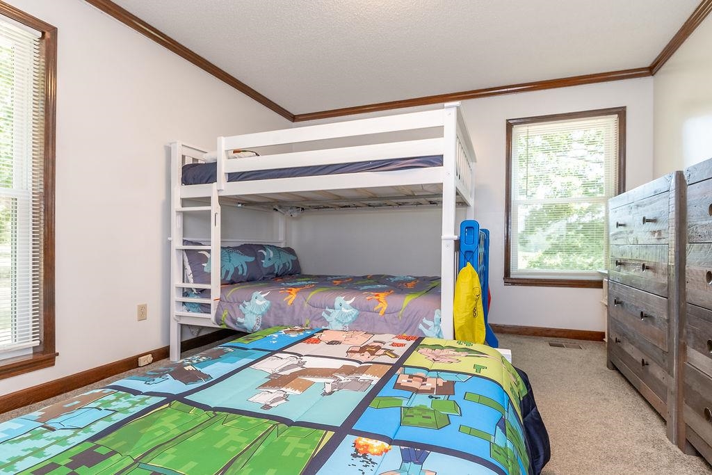5870 Monk House Road Somerville, TN 38068 - Photo 26 of 40 a bedroom with a bed and a window
