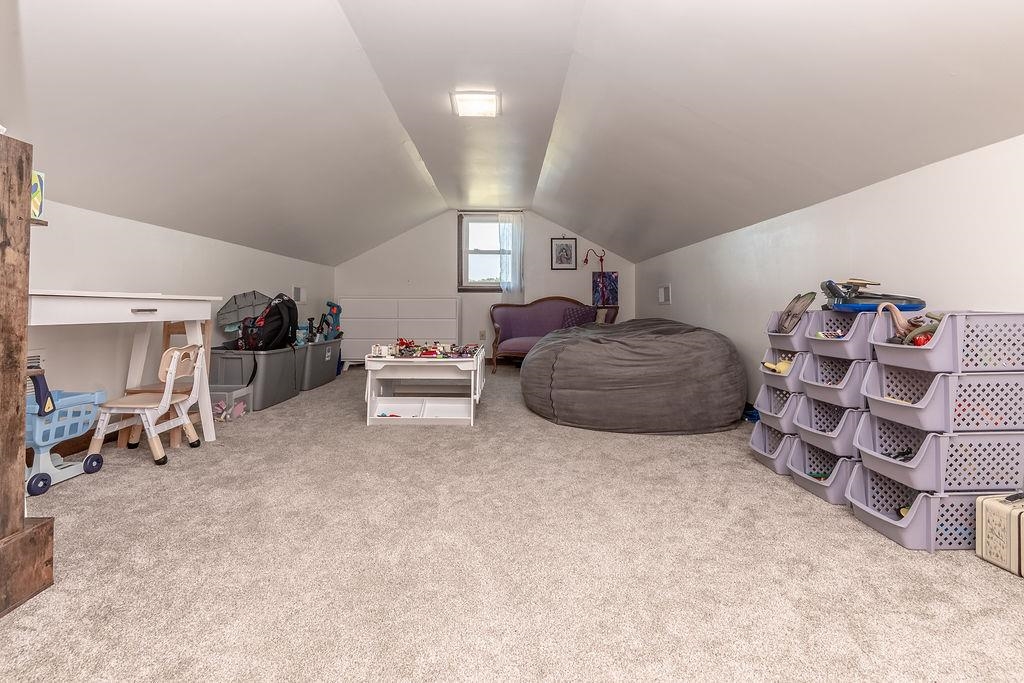 5870 Monk House Road Somerville, TN 38068 - Photo 29 of 40 a living room with furniture and a lamp