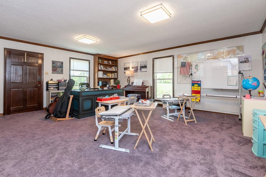 5870 Monk House Road Somerville, TN 38068 - Photo 30 of 40 a view of a livingroom with furniture and a window