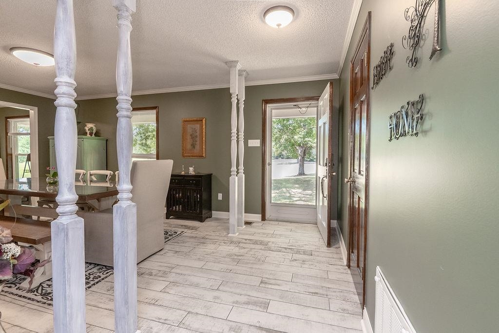 5870 Monk House Road Somerville, TN 38068 - Photo 7 of 40 a view of a livingroom with furniture and windows
