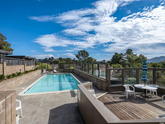 a view of a terrace with sitting area