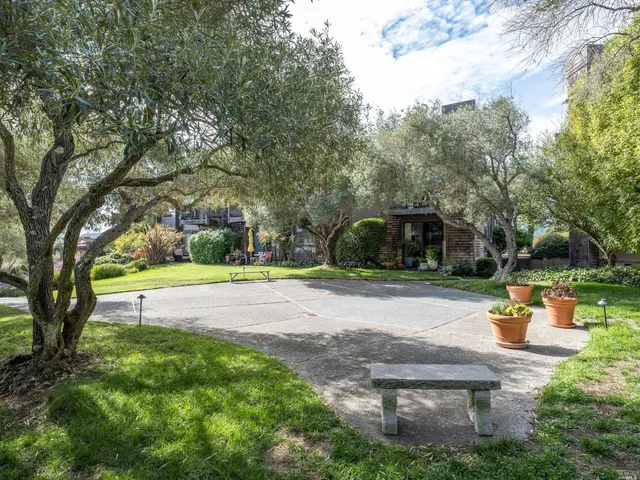a view of a swimming pool with a patio