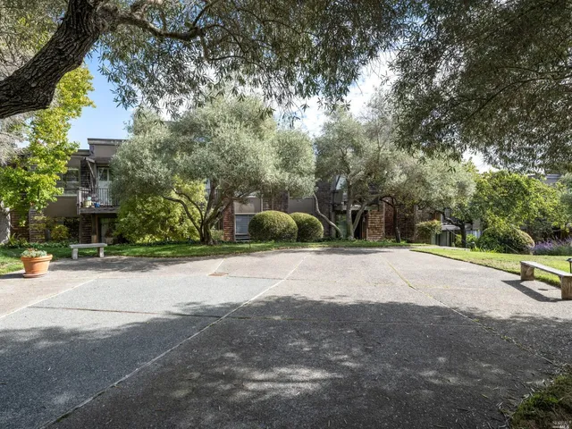 a view of a street with a houses