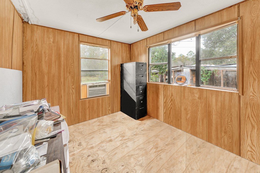 96697 Blackrock Road Yulee, FL 32097 - Photo 10 of 17 a bedroom with a bed and a window