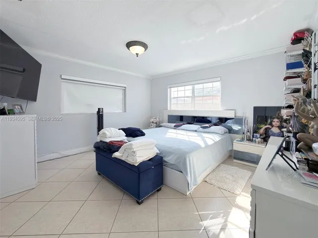 a bed room with a bed and a couch