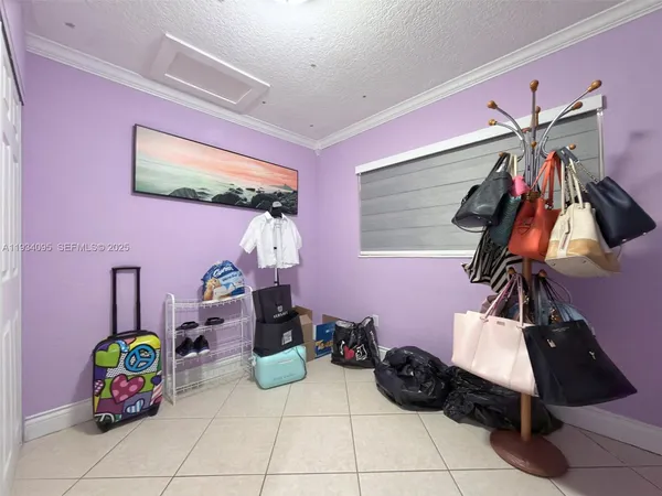 a room with furniture and a window