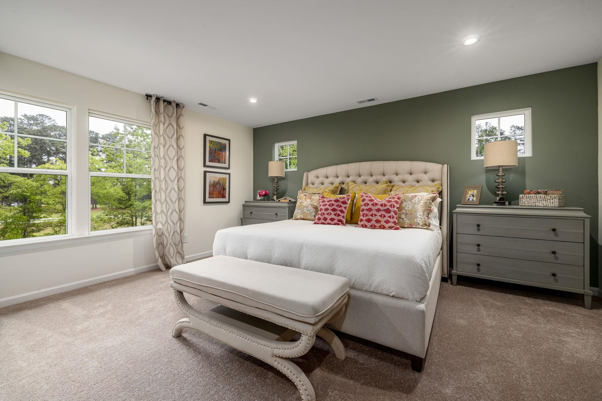 6512 Winter Spring Drive Wake Forest, NC 27587 - Photo 18 of 34 a bedroom with a bed and a dresser