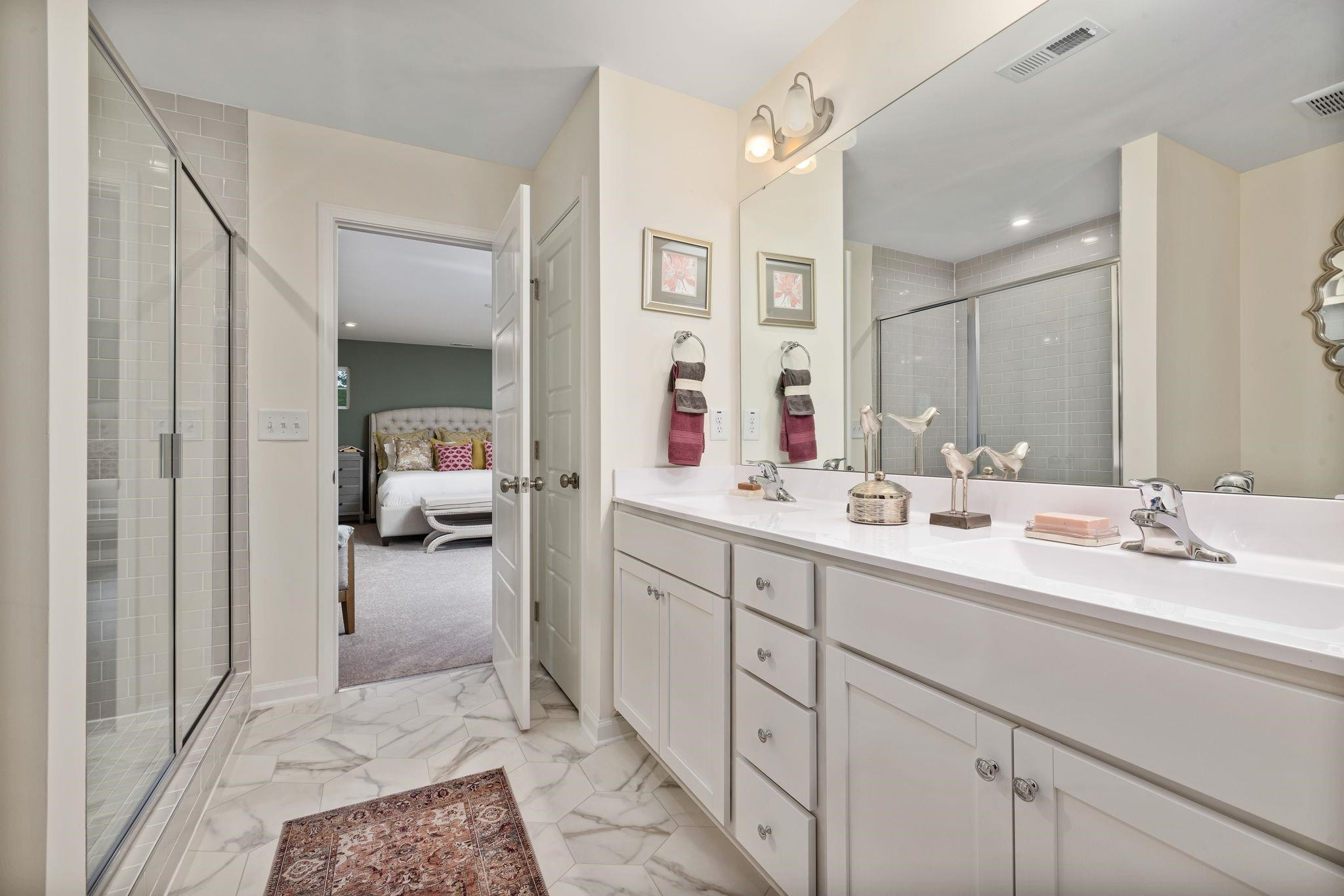 6512 Winter Spring Drive Wake Forest, NC 27587 - Photo 21 of 34 a bathroom with a sink and a mirror