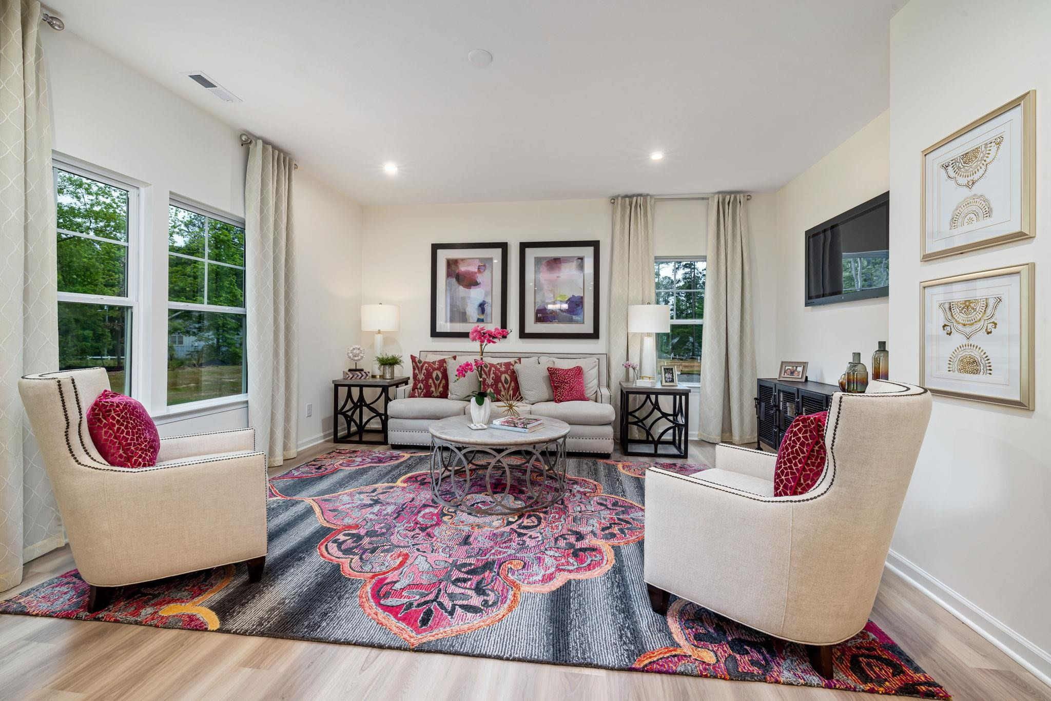 6512 Winter Spring Drive Wake Forest, NC 27587 - Photo 4 of 34 a living room with furniture and a gate