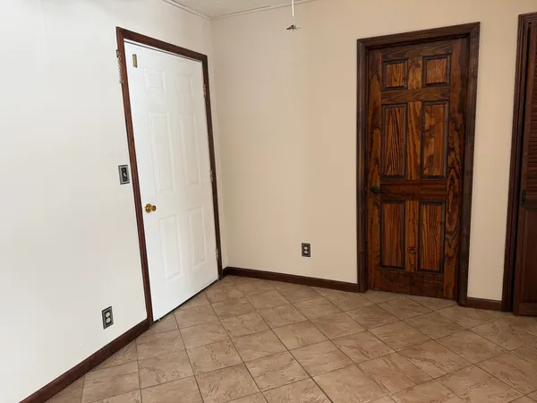 an empty room with closet