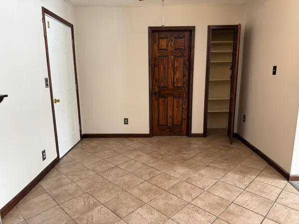 an empty room with windows