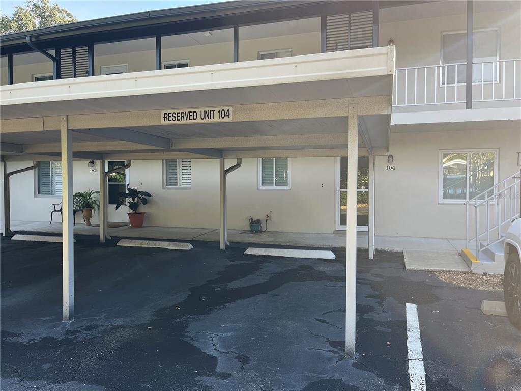 210 Magnolia Road, Unit 104 Maitland, FL 32751 - Photo 1 of 16 a view of a front door and bedroom