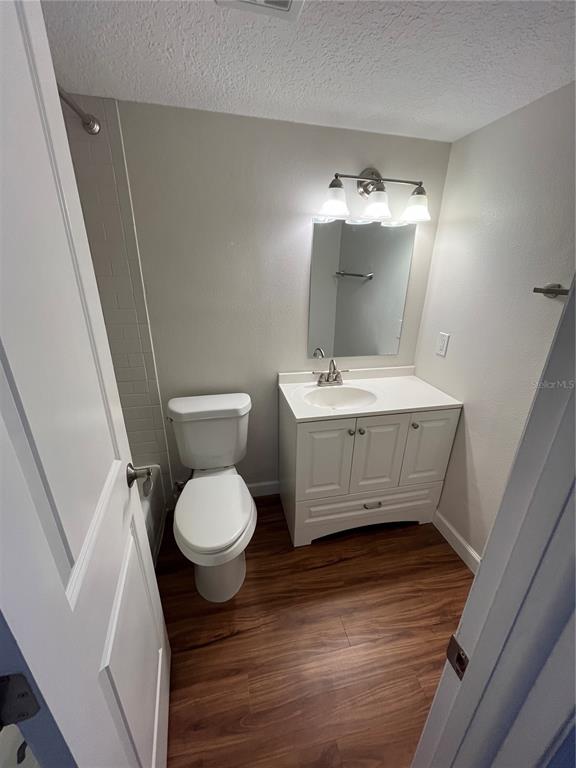 210 Magnolia Road, Unit 104 Maitland, FL 32751 - Photo 9 of 16 a bathroom with a sink and a mirror