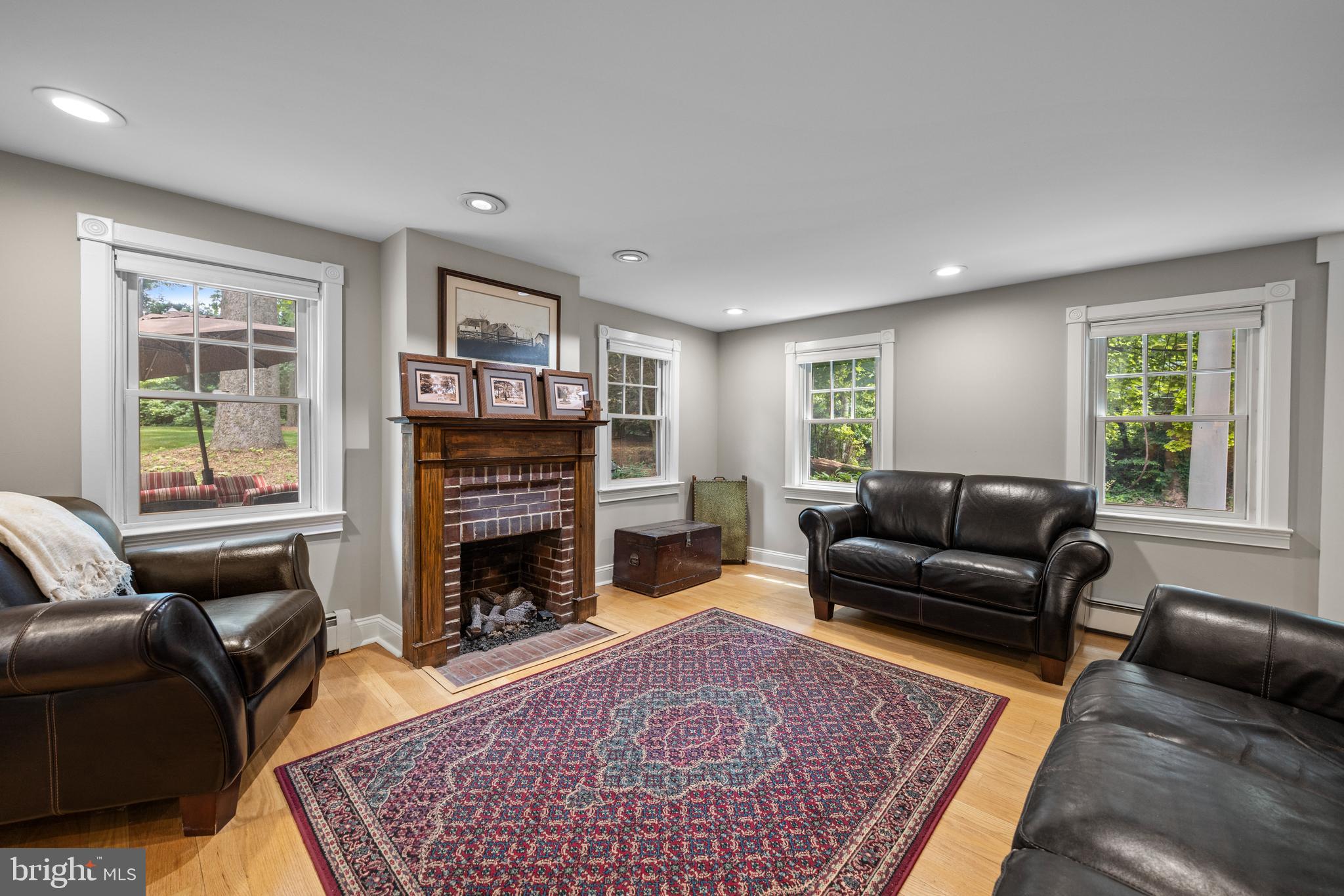 136 Lambs Road Sewell, NJ 08080 - Photo 12 of 65 a living room with furniture and a fireplace