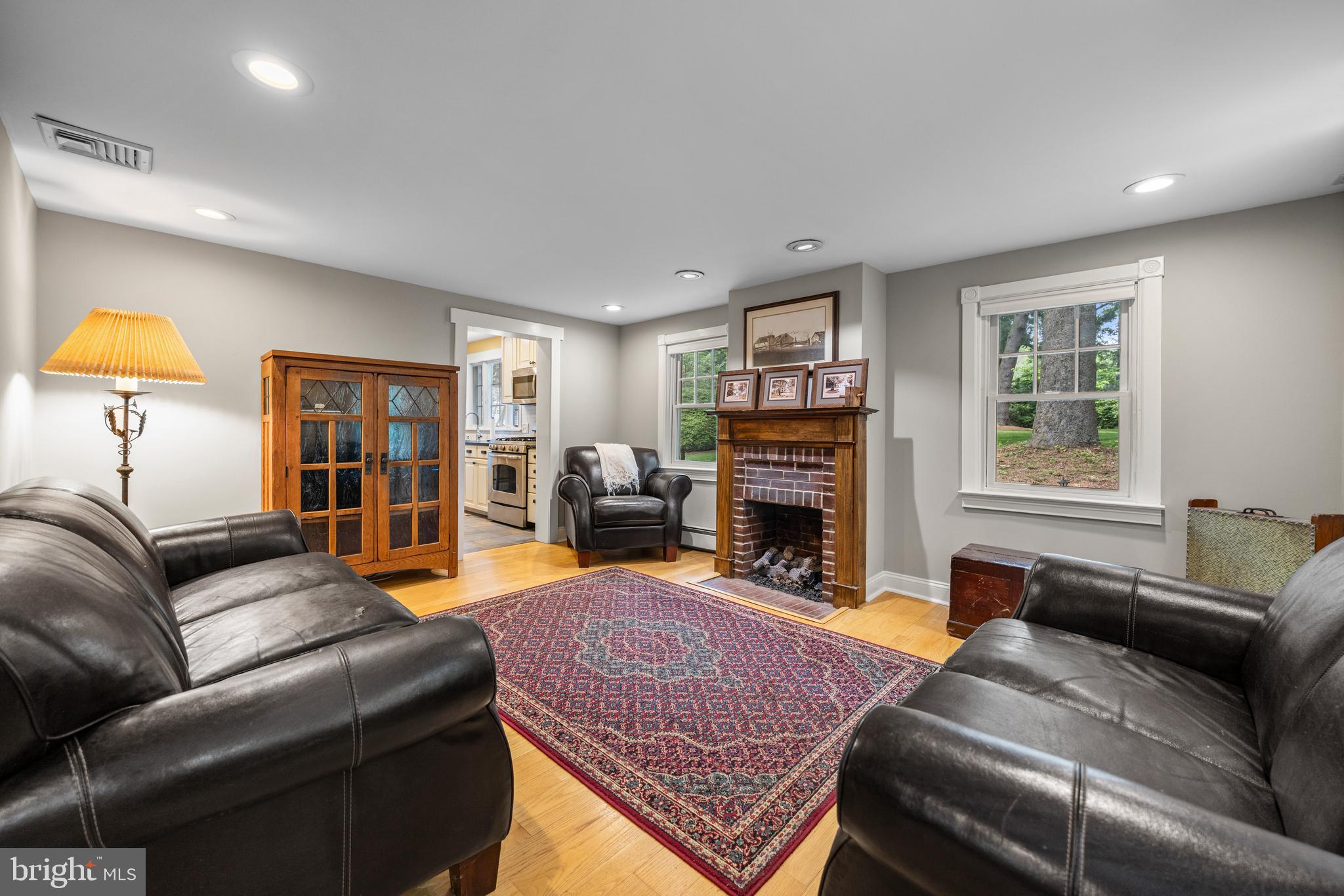 136 Lambs Road Sewell, NJ 08080 - Photo 13 of 65 a living room with furniture and a fireplace