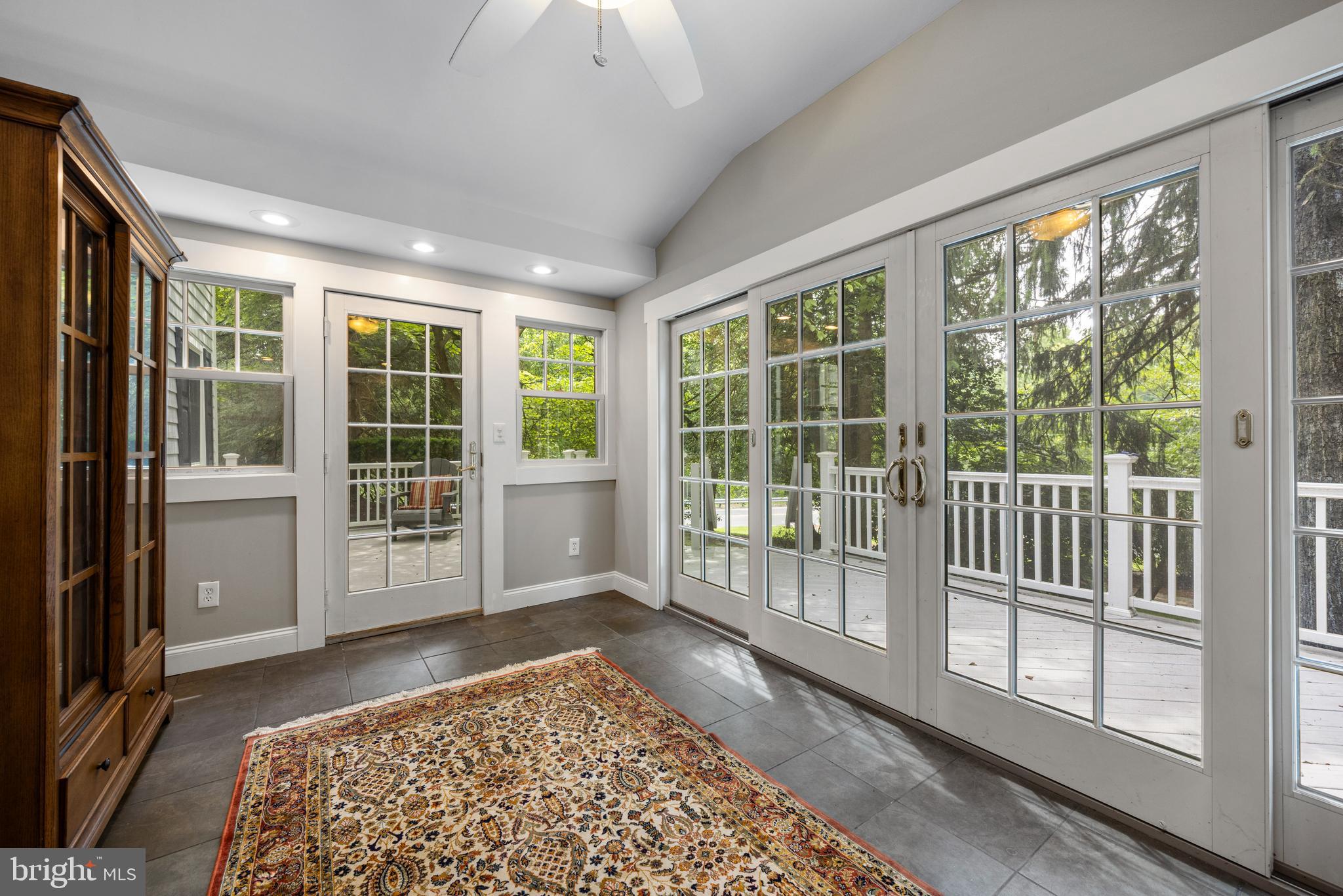 136 Lambs Road Sewell, NJ 08080 - Photo 16 of 65 a view of a bedroom with wooden floor and windows