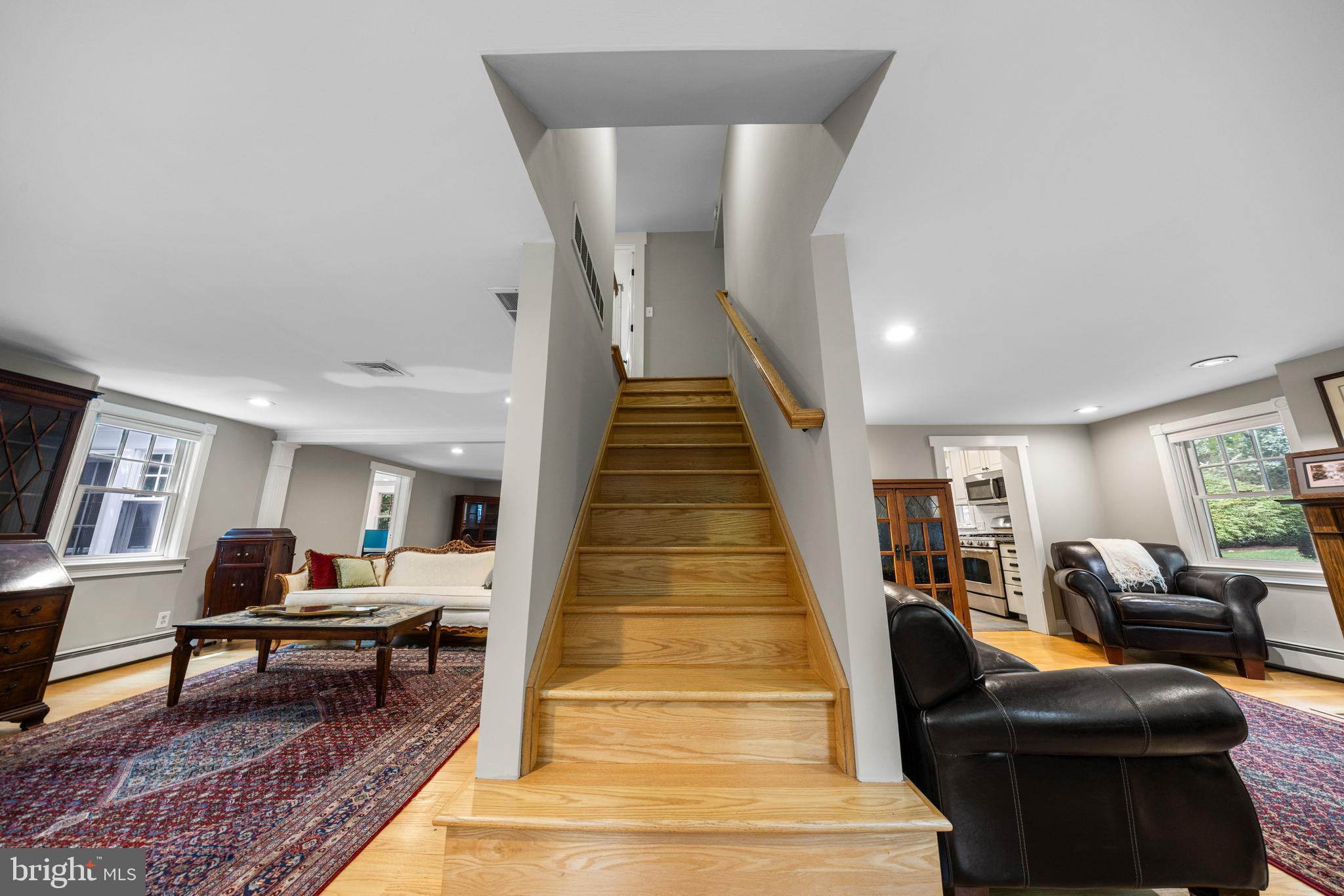 136 Lambs Road Sewell, NJ 08080 - Photo 19 of 65 a living room with furniture and a book shelf