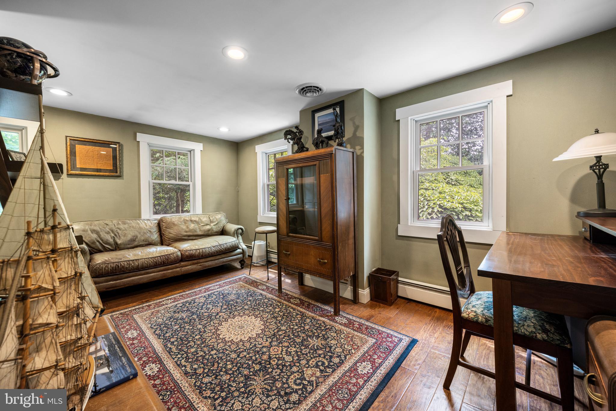 136 Lambs Road Sewell, NJ 08080 - Photo 24 of 65 a living room with furniture and a rug