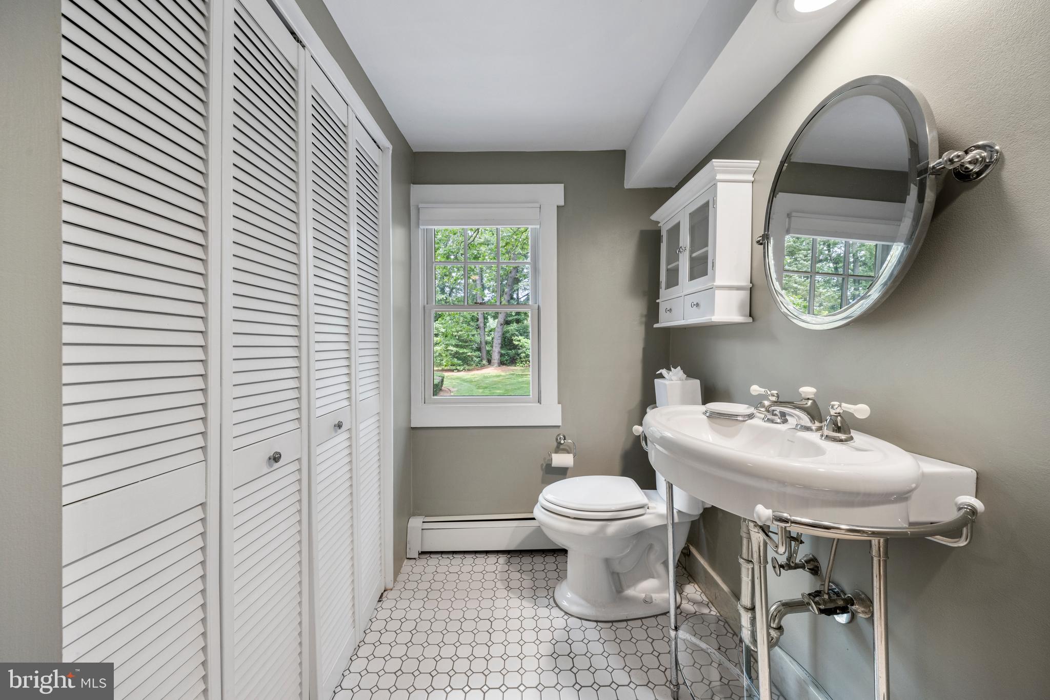 136 Lambs Road Sewell, NJ 08080 - Photo 27 of 65 a bathroom with a sink toilet and a mirror