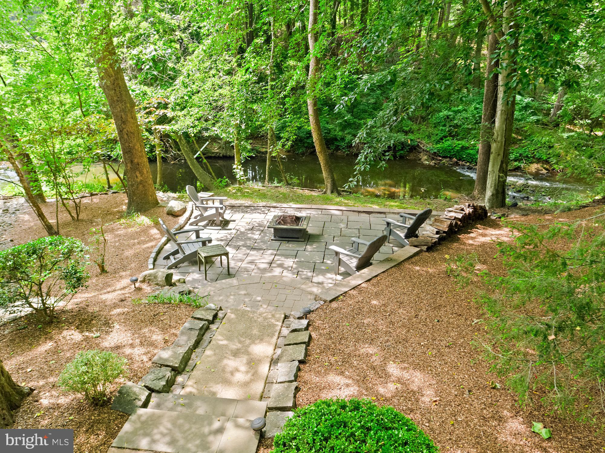 136 Lambs Road Sewell, NJ 08080 - Photo 34 of 65 a view of backyard with a table and chairs and couches