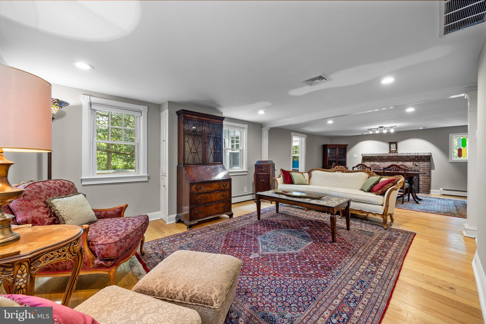 136 Lambs Road Sewell, NJ 08080 - Photo 5 of 65 a living room with furniture a rug and a table