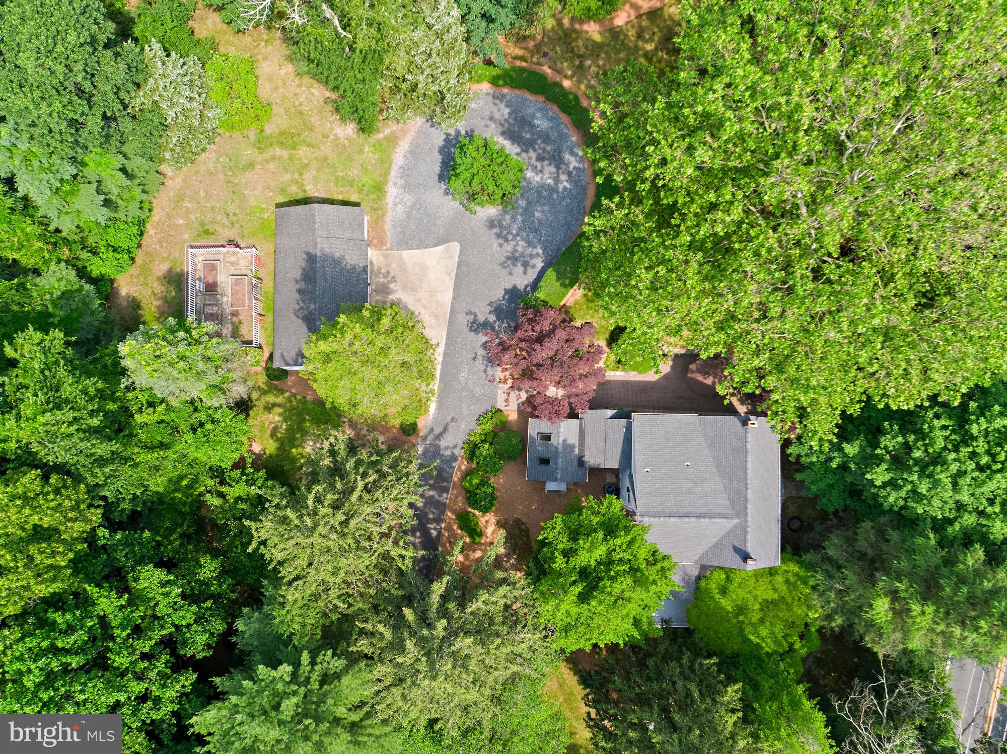 136 Lambs Road Sewell, NJ 08080 - Photo 53 of 65 an aerial view of a house with large trees