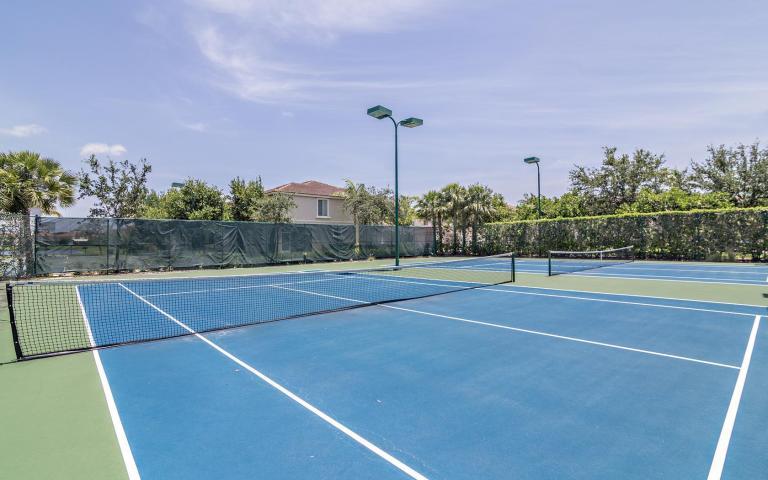 3117 Laurel Ridge Circle Riviera Beach, FL 33404 - Photo 26 of 27 a view of a tennis court
