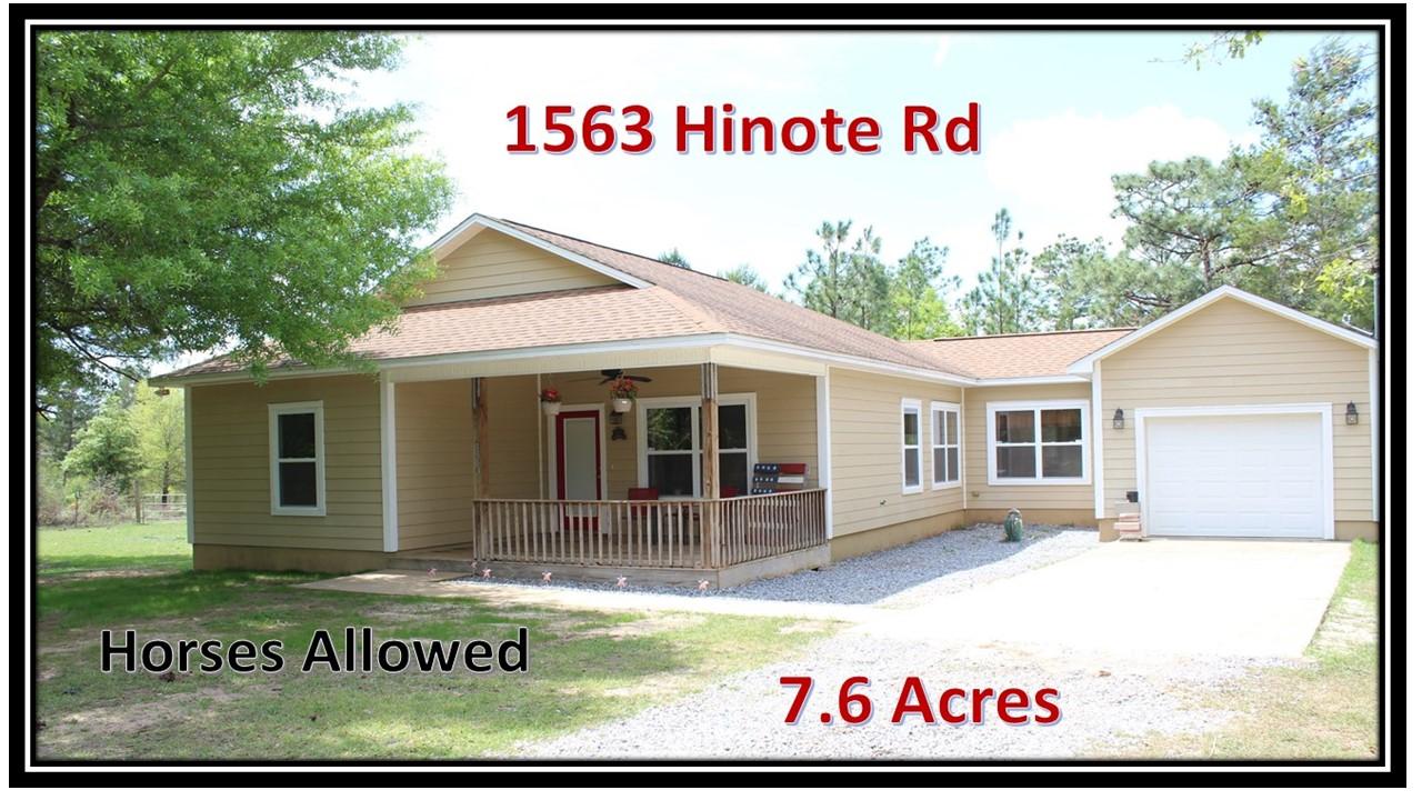 1563 Hinote Road DeFuniak Springs, FL 32433 - Photo 1 of 36 a sign that is on the side of a building