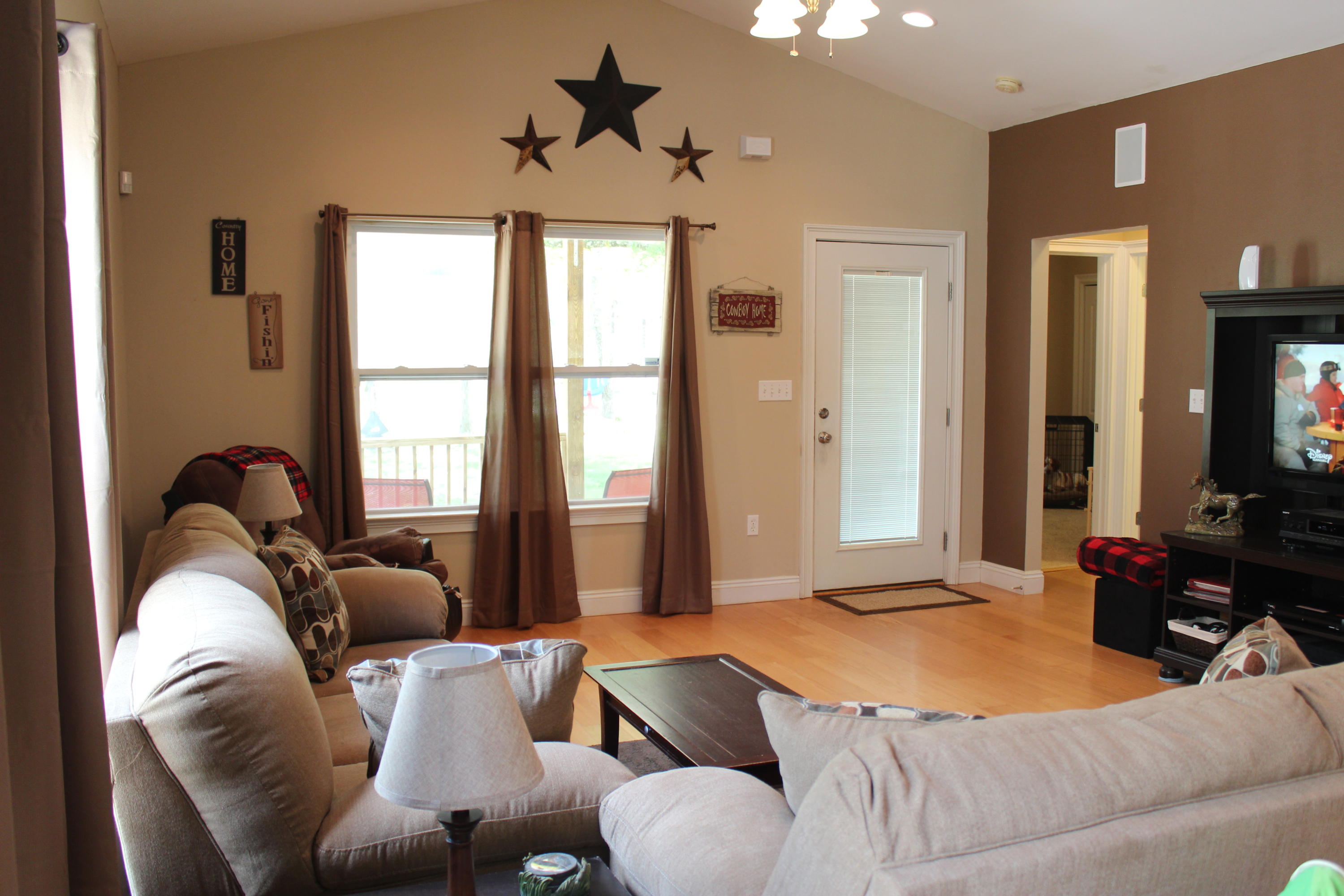 1563 Hinote Road DeFuniak Springs, FL 32433 - Photo 11 of 36 a bedroom with a bed couch and a window