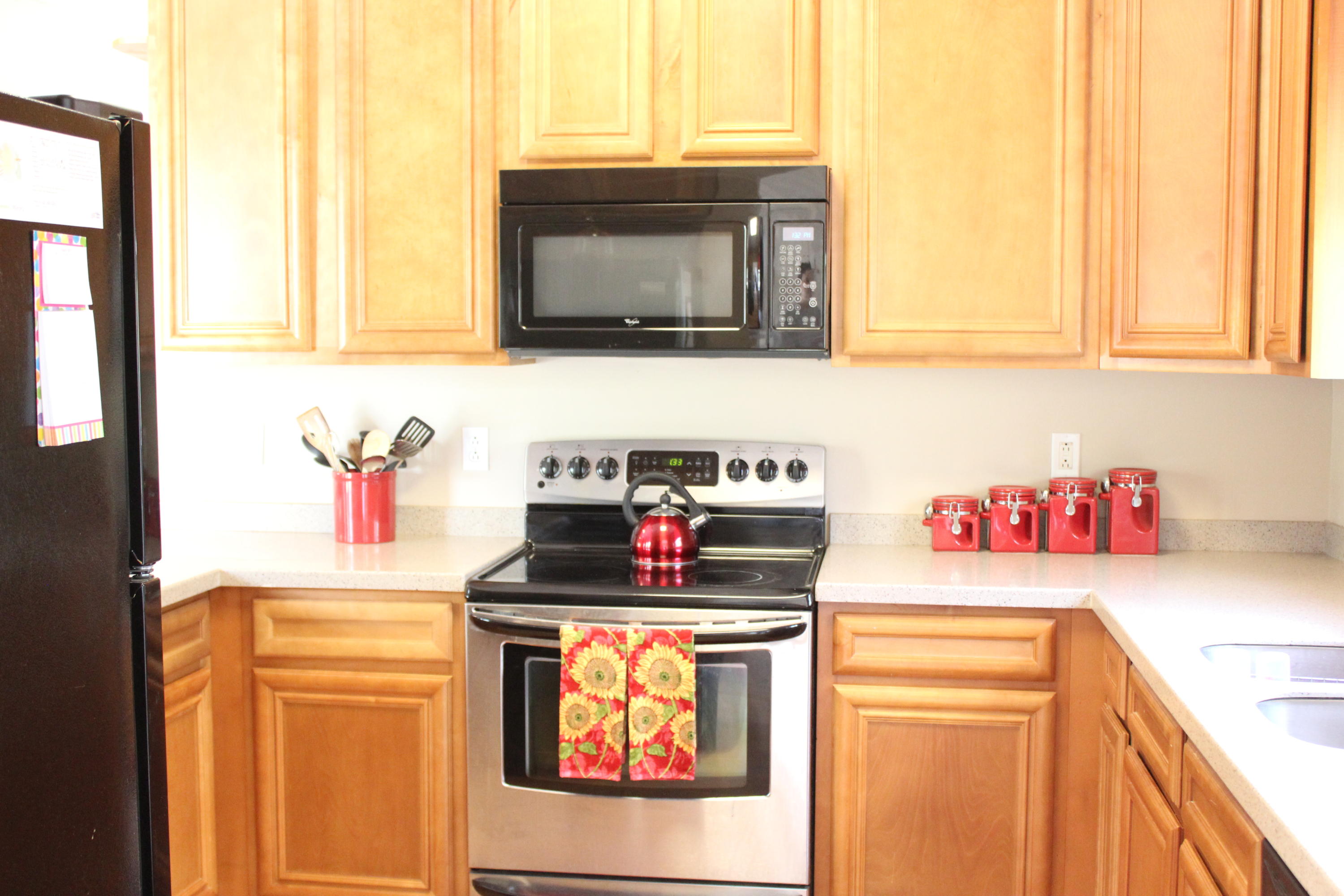 1563 Hinote Road DeFuniak Springs, FL 32433 - Photo 14 of 36 a kitchen with a stove and a microwave