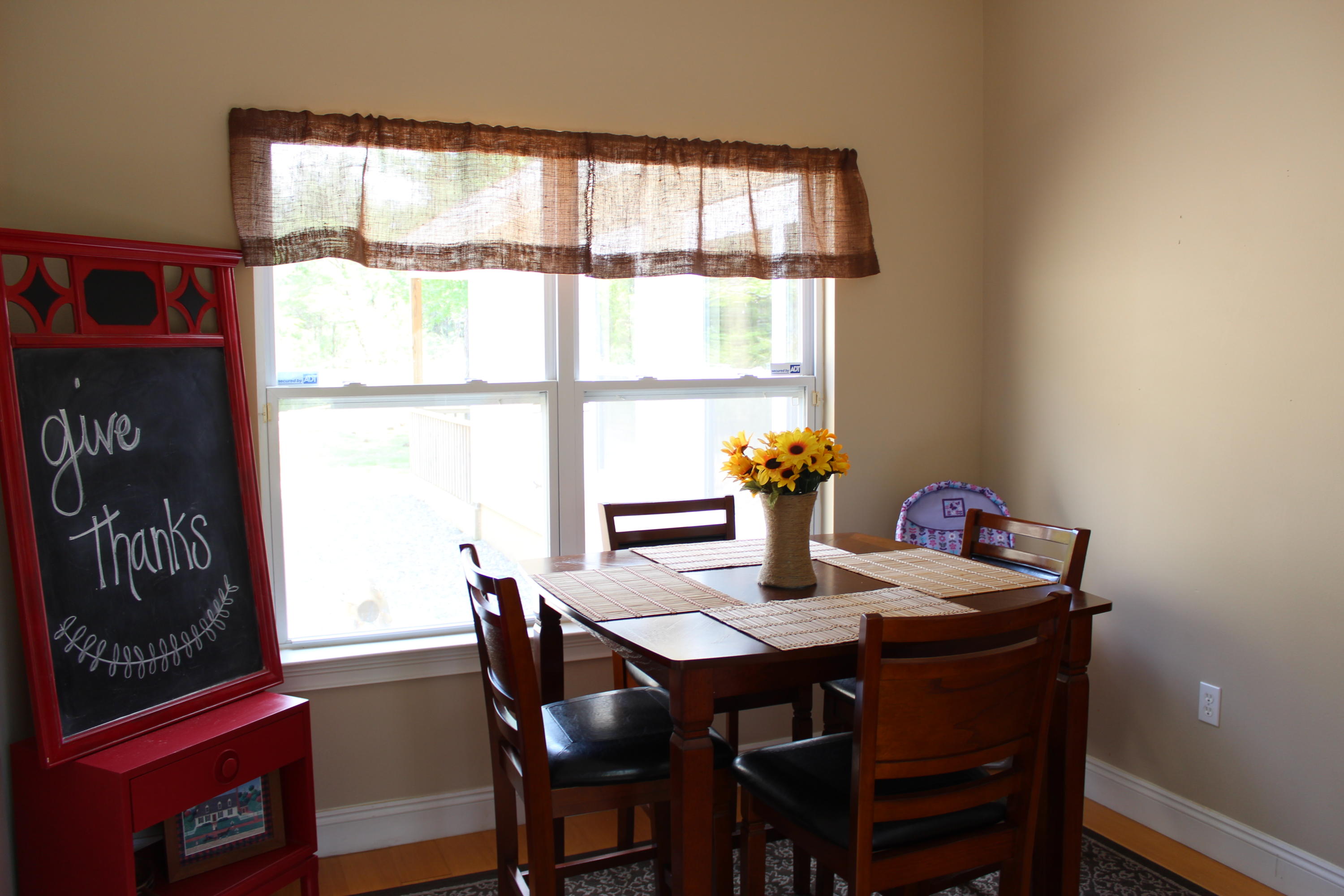 1563 Hinote Road DeFuniak Springs, FL 32433 - Photo 16 of 36 a view of a dining room with furniture window and outside view