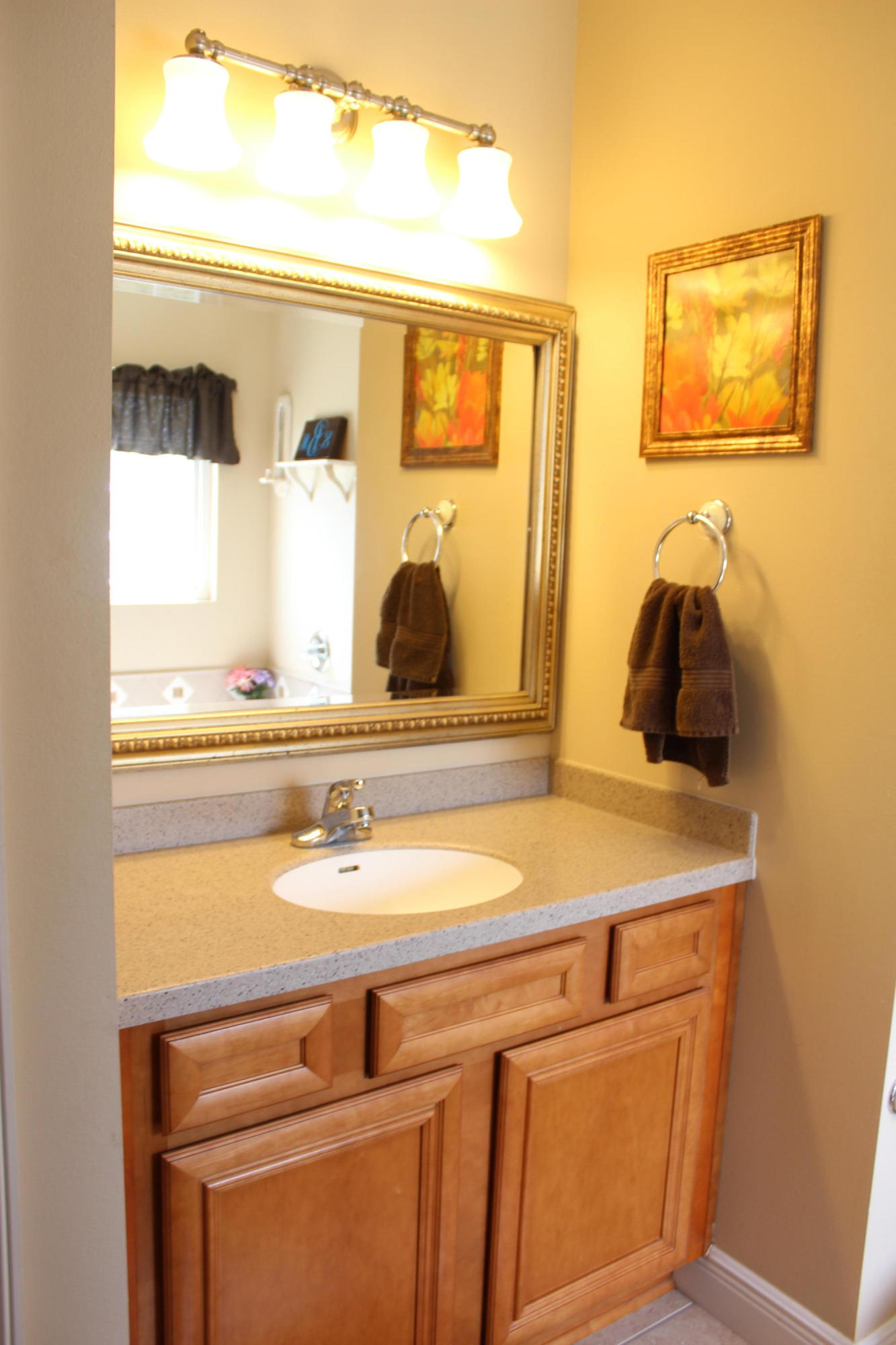 1563 Hinote Road DeFuniak Springs, FL 32433 - Photo 23 of 36 a view of a sink and a mirror