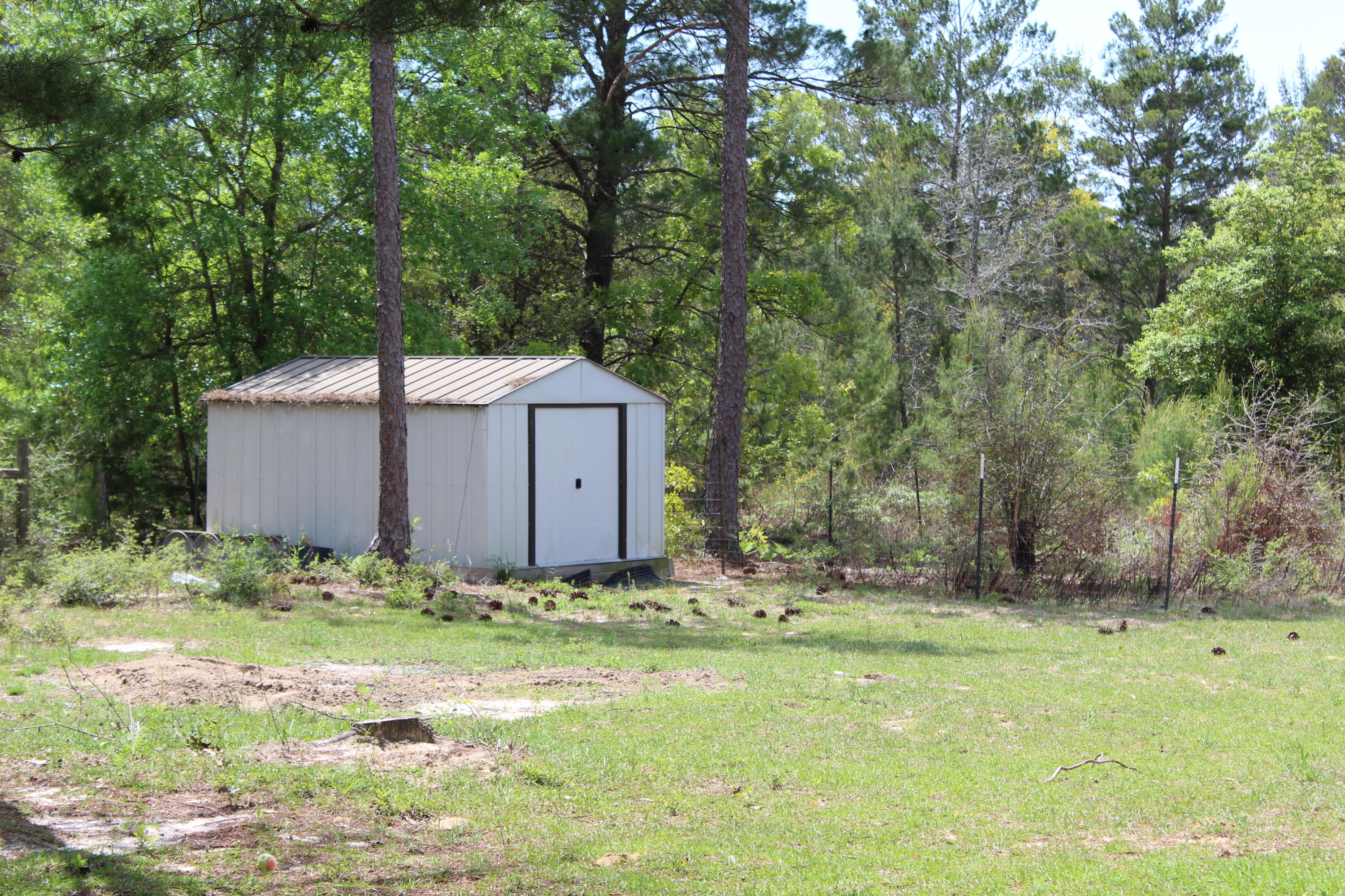 1563 Hinote Road DeFuniak Springs, FL 32433 - Photo 36 of 36 a backyard of a house