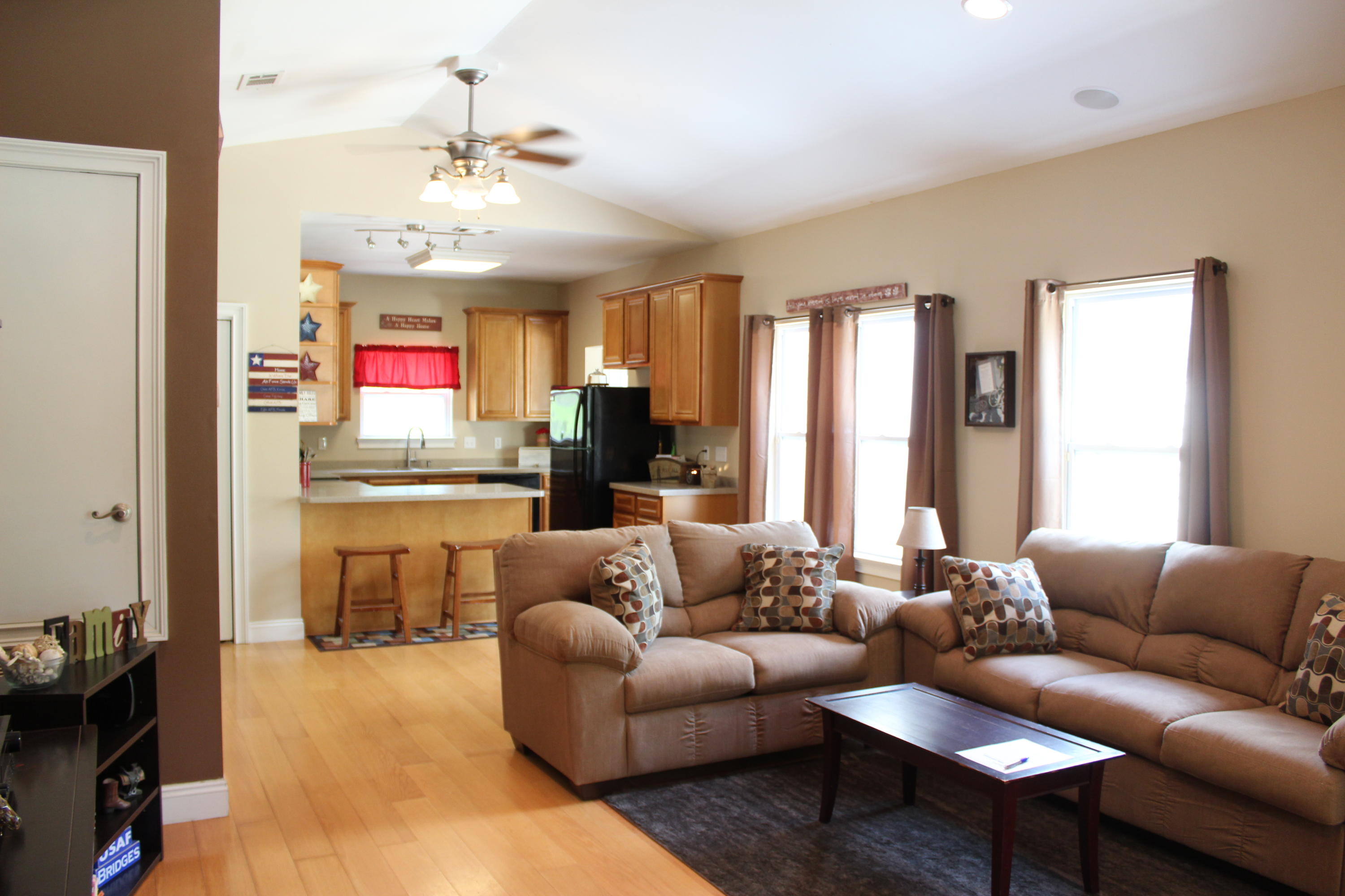 1563 Hinote Road DeFuniak Springs, FL 32433 - Photo 10 of 36 a living room with furniture kitchen view and a window