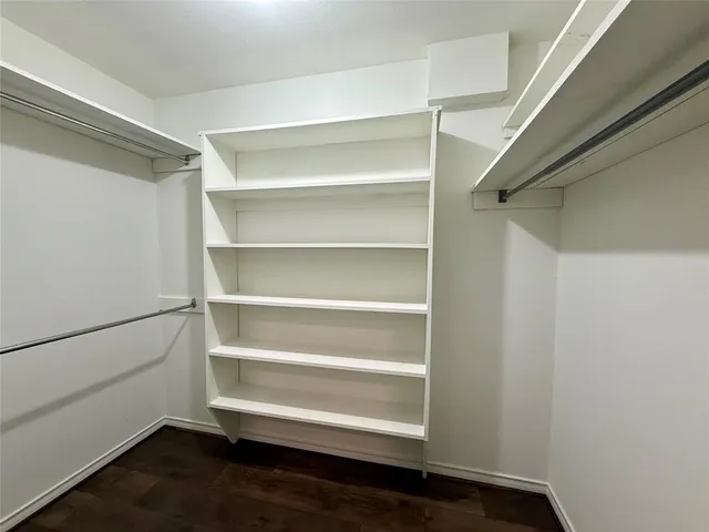 a storage room with wooden floor