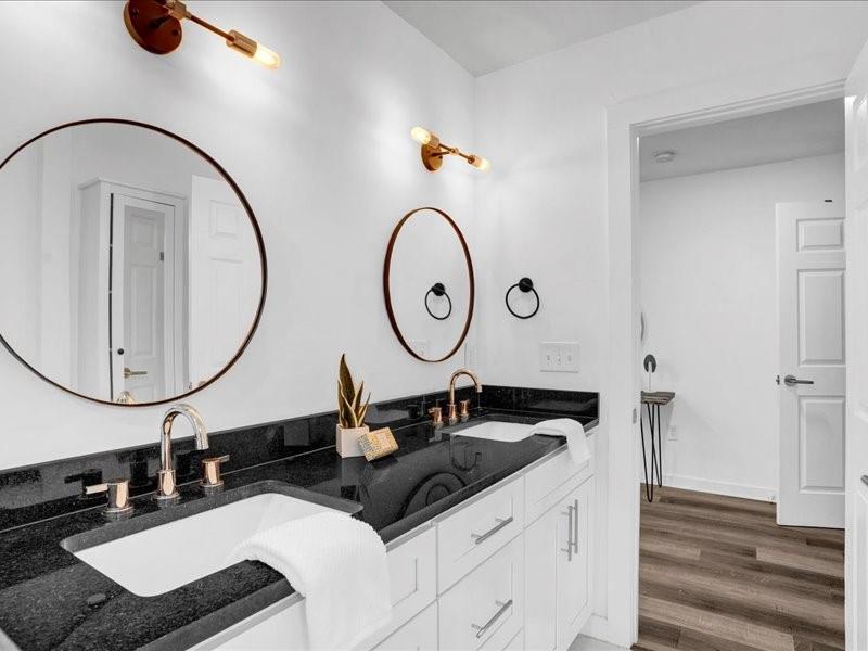 1743 Old Hickory Street Decatur, GA 30032 - Photo 16 of 27 a bathroom with a double vanity sink and a mirror