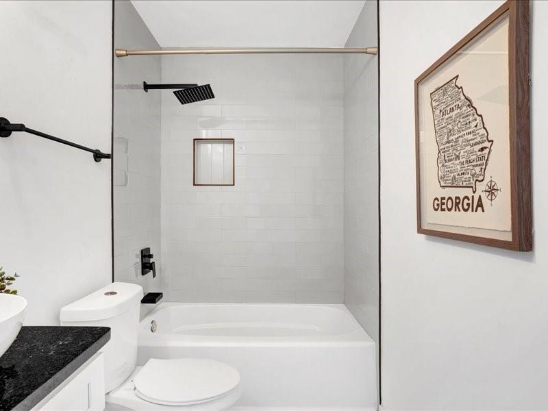 1743 Old Hickory Street Decatur, GA 30032 - Photo 21 of 27 a bathroom with a shower and a toilet