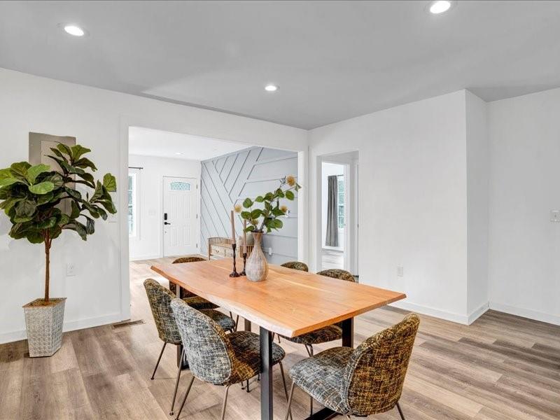 1743 Old Hickory Street Decatur, GA 30032 - Photo 6 of 27 a view of a dining room with furniture and wooden floor