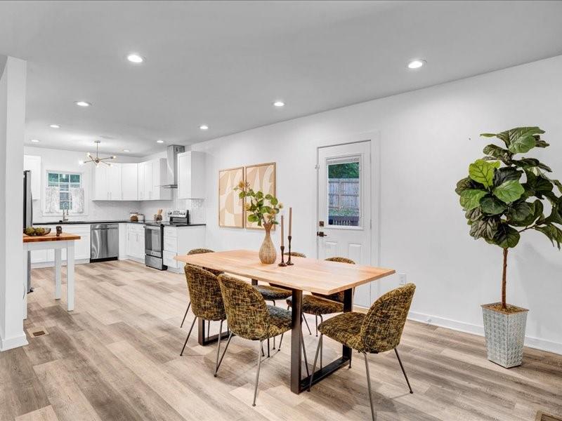 1743 Old Hickory Street Decatur, GA 30032 - Photo 8 of 27 a dining room with furniture and potted plants
