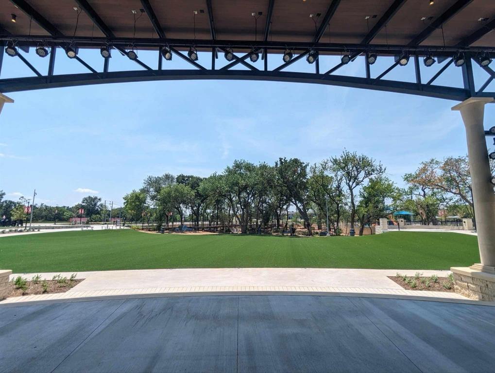 1536 Euclid Alley Corinth, TX 76208 - Photo 11 of 35 a view of a room with a yard and potted plants