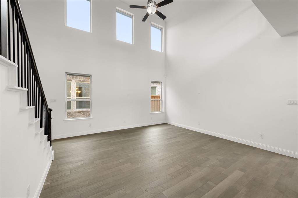 1536 Euclid Alley Corinth, TX 76208 - Photo 13 of 35 a view of an empty room with a window