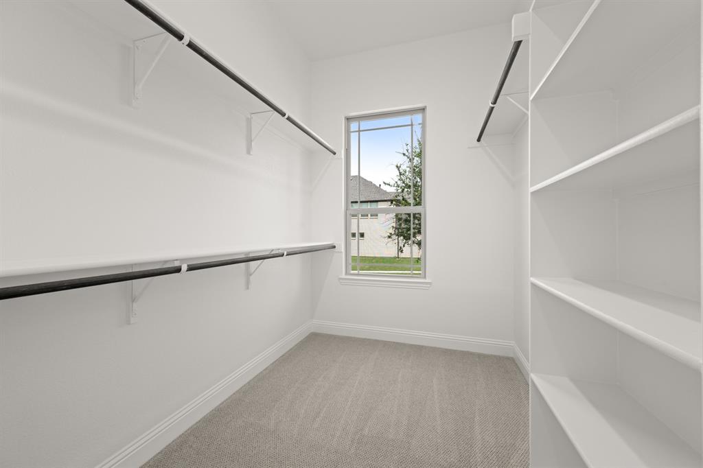 1536 Euclid Alley Corinth, TX 76208 - Photo 25 of 35 a view of an empty room with a window