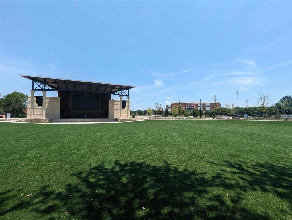 1536 Euclid Alley Corinth, TX 76208 - Photo 4 of 35 a view of a house with a big yard and large trees