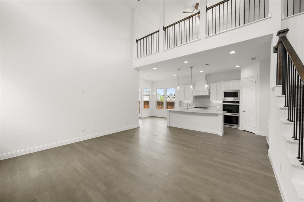 1536 Euclid Alley Corinth, TX 76208 - Photo 9 of 35 a view of kitchen with kitchen island and stainless steel appliances