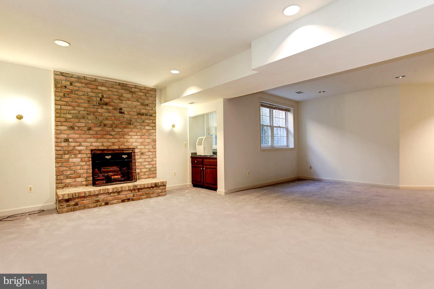 130 South River Landing Road Edgewater, MD 21037 - Photo 24 of 30 Rec Room with Gathering Fireplace and Wet Bar