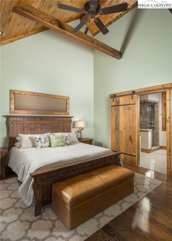 331 Goldenrod Road Boone, NC 28607 - Photo 17 of 50 a bedroom with a bed and wooden floor