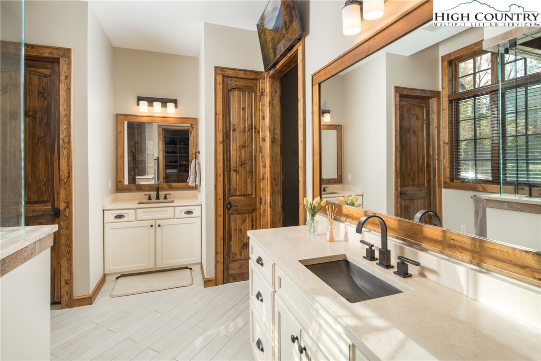 331 Goldenrod Road Boone, NC 28607 - Photo 18 of 50 a kitchen with a sink and a refrigerator